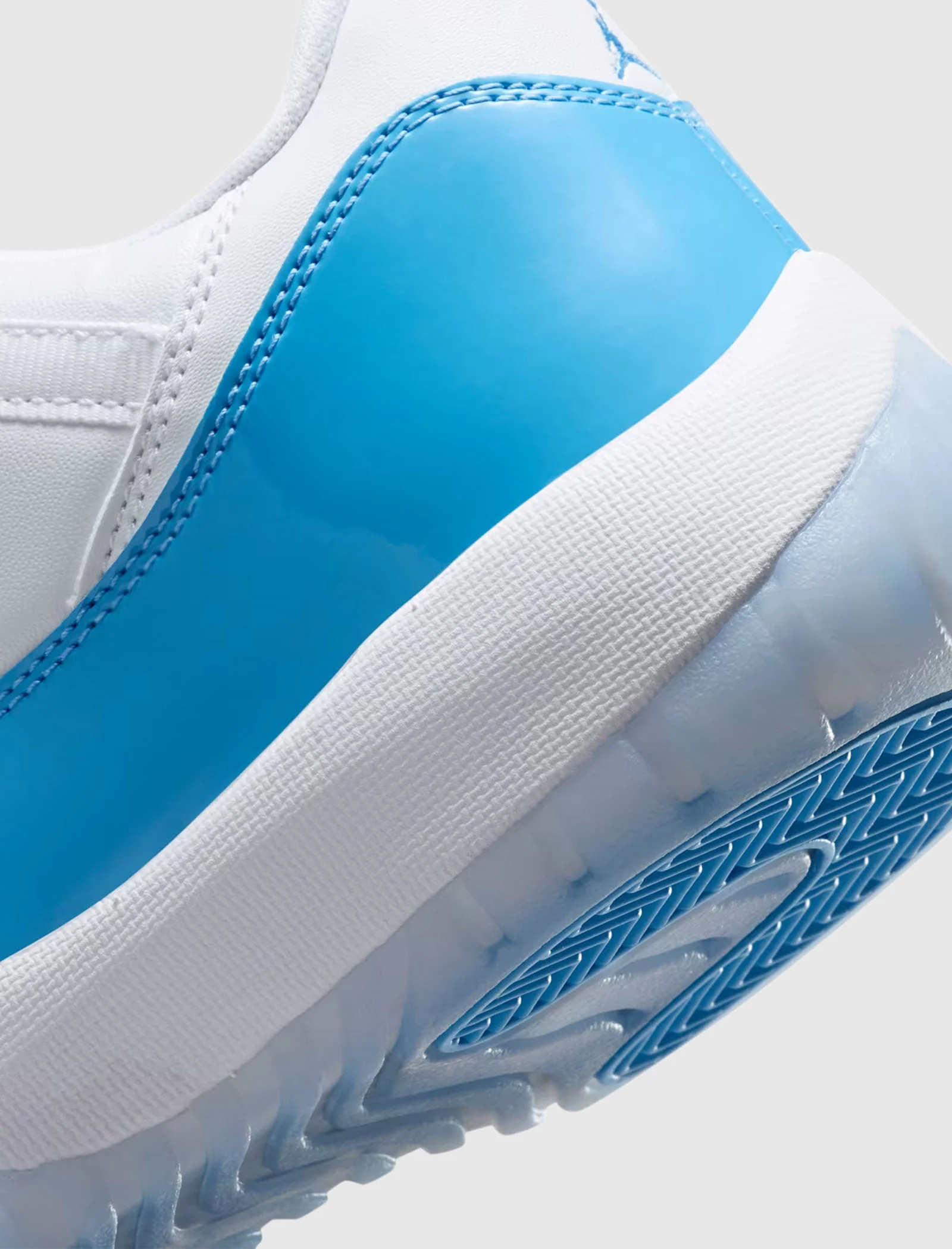AIR JORDAN 11 RETRO LOW "WHITE/UNIVERSITY BLUE/BLACK" - Image 3