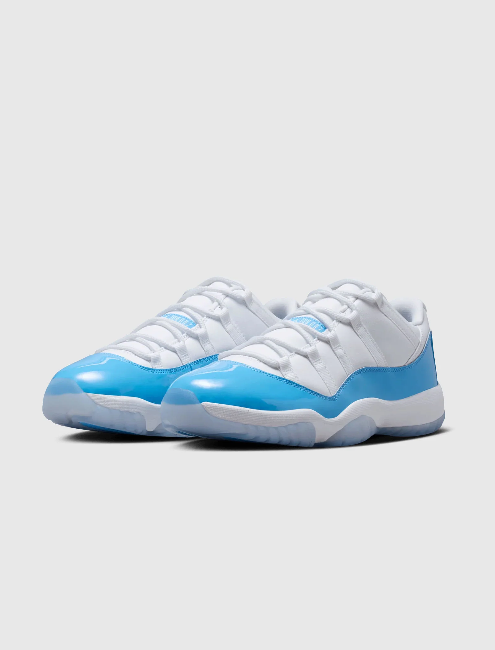 AIR JORDAN 11 RETRO LOW "WHITE/UNIVERSITY BLUE/BLACK" - Image 4
