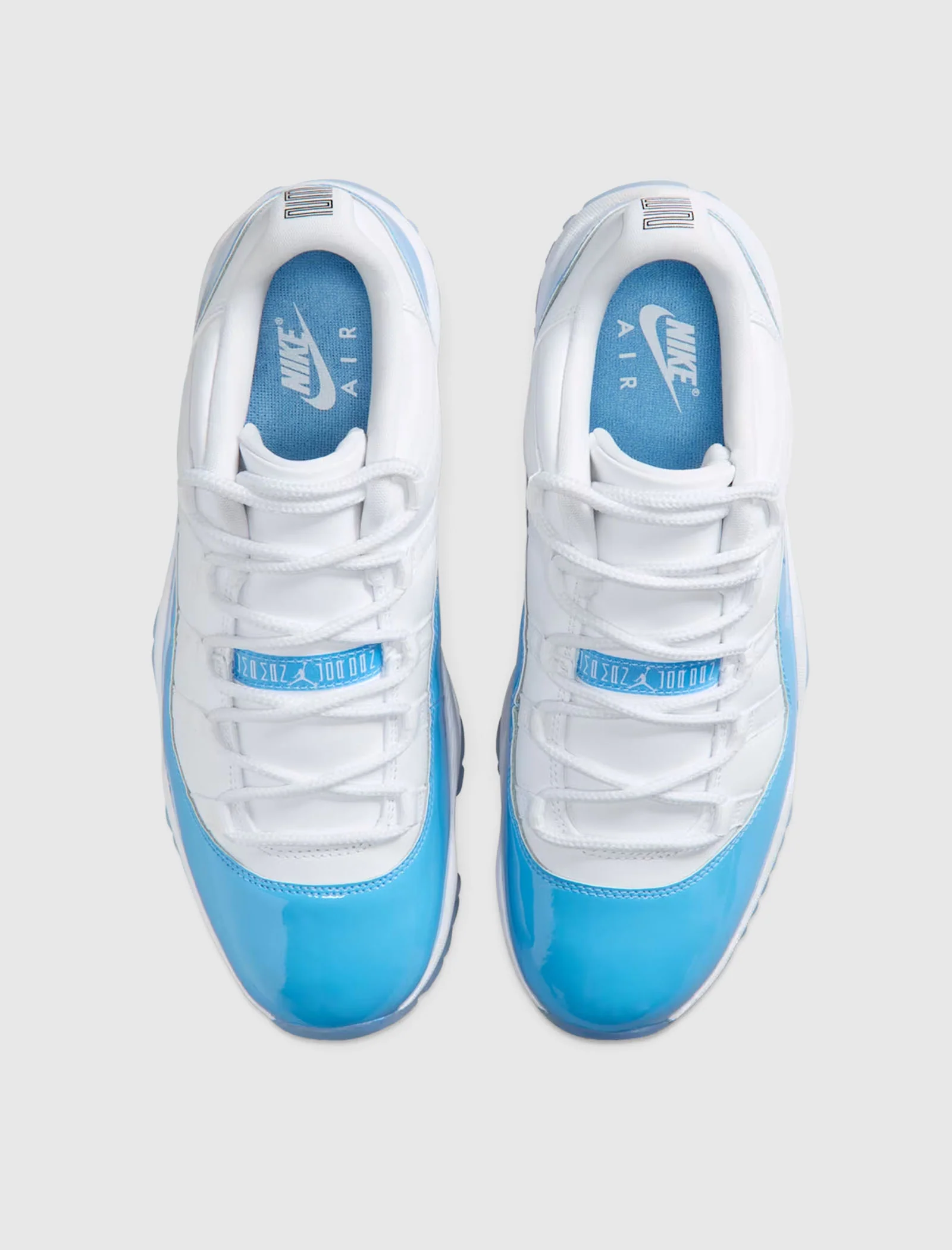 AIR JORDAN 11 RETRO LOW "WHITE/UNIVERSITY BLUE/BLACK" - Image 5